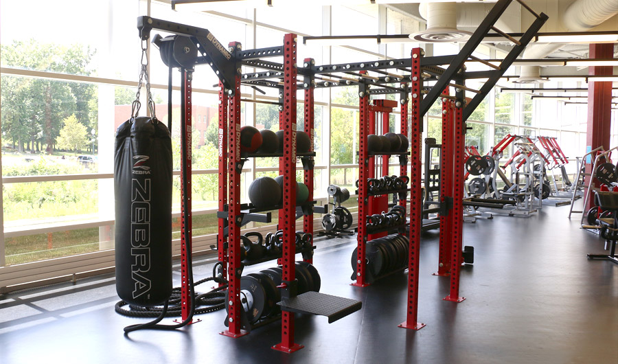 Image shows weight room and it's new floor with Rose-Hulman athletics logo.